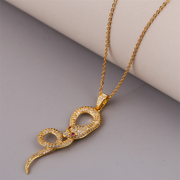 snake-eating-itself-necklace-gold